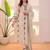 Cream rayon slub heavy thread embroidery work kurta pant set