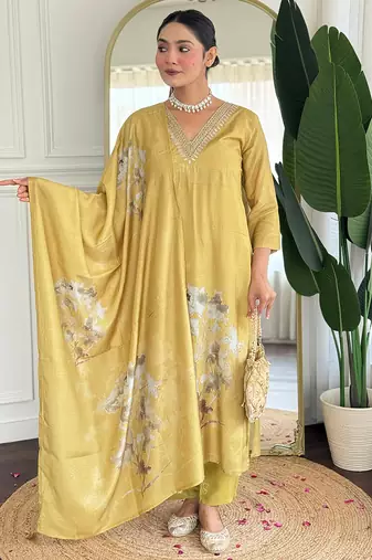 Yellow pure muslin heavy thread embroidery work with digital print kurta pant set