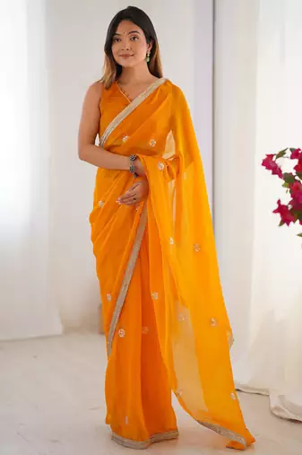 Yellow chiffon lace work party wear saree