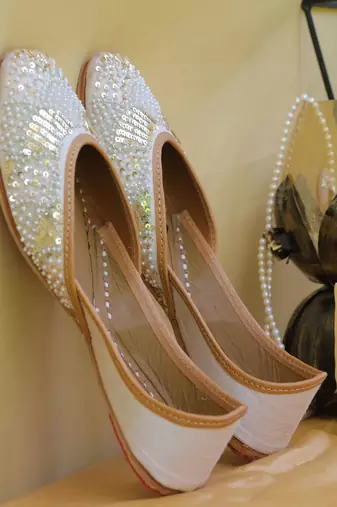 White sequin embroidered leather juttis