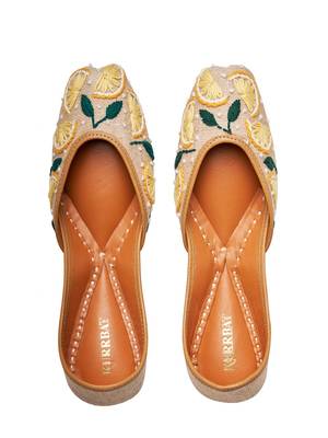 Beige embroidered leather juttis 1