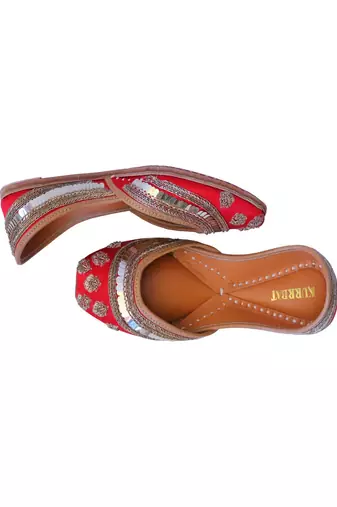 Red embroidered leather juttis