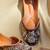 Brown floral embroidered leather juttis