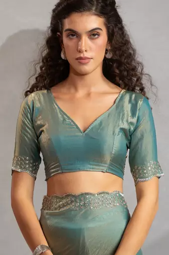 Ice blue color hand work zarkan with cutdana work border fendy silk blend two tone saree with blouse