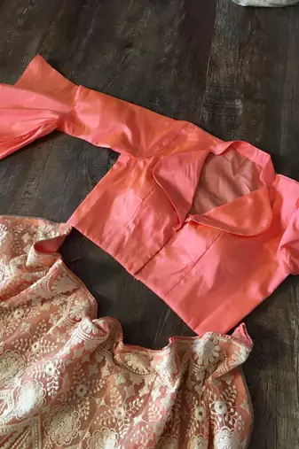 Lavishing Peach Net Lakhnavi Work Party Wear Crop Top Lehenga