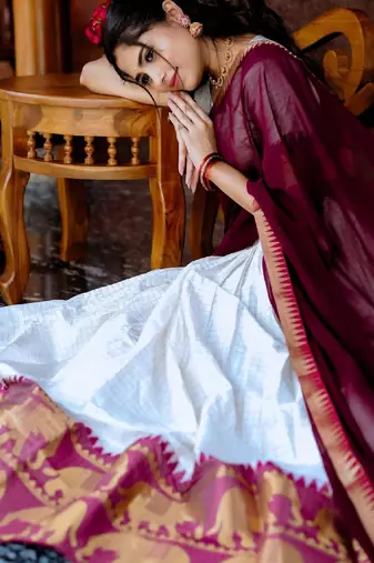 off white half saree with maroon dupatta