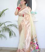 Cream color paithani silk saree with beautiful festive looks