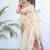 Cream color paithani silk saree with beautiful festive looks
