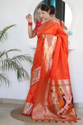 Orange color paithani silk saree with beautiful festive looks