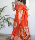 Orange color paithani silk saree with beautiful festive looks