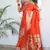 Orange color paithani silk saree with beautiful festive looks