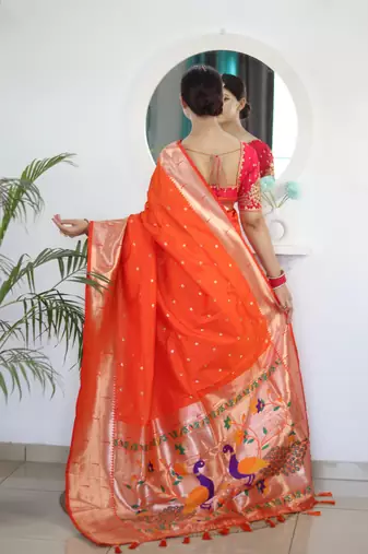 Orange paithani silk blend saree with festive looks