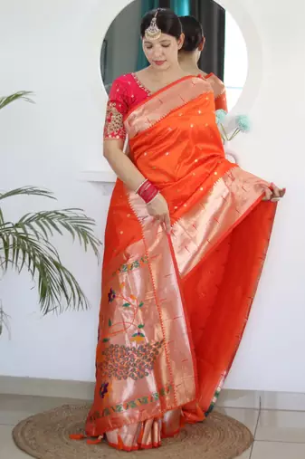 Orange paithani silk blend saree with festive looks
