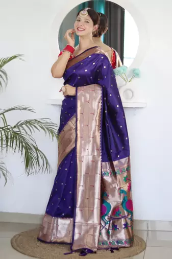 Violet color paithani silk saree with beautiful festive looks