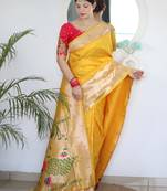 Yellow color paithani silk saree with beautiful festive looks