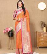 Orange color soft silk fabric ethnic weaving jacquard partywear heavy saree