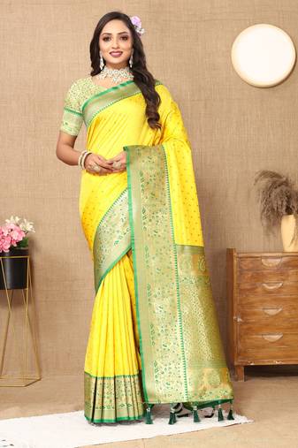 Yellow color soft silk fabric ethnic weaving jacquard designer partywear heavy saree