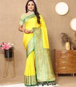 Yellow color soft silk fabric ethnic weaving jacquard partywear heavy saree