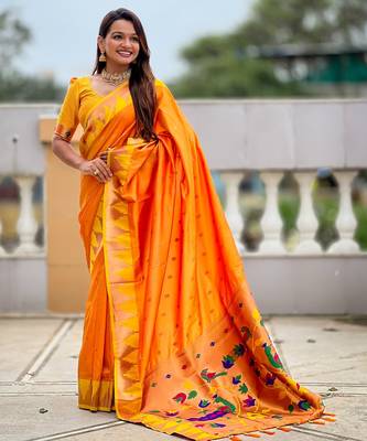 Orange sophisticated paithani silk blend woven jacquard meenakari saree 1