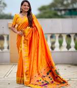 Orange color sophisticated paithani silk fabric woven jacquard meenakari saree