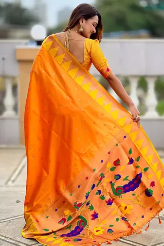 Orange sophisticated paithani silk blend woven jacquard meenakari saree