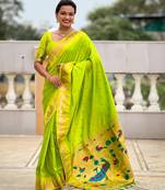 Parrot green color sophisticated paithani silk fabric woven jacquard meenakari saree
