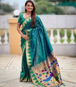 Rama color sophisticated paithani silk fabric woven jacquard meenakari saree