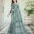 Green color linen fabric sophisticated floral embroidered saree