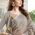 Light beige color linen fabric sophisticated floral embroidered saree