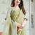 Pista green color linen fabric sophisticated floral embroidered saree