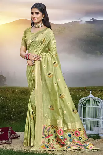 Green color graceful woven meenakari designer saree on assam silk fabric