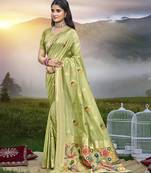 Green color graceful woven meenakari saree on assam silk fabric