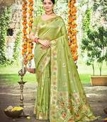 Green color heavy looks woven meenakari designer assam silk saree