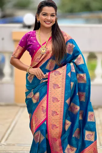 Teal blue woven meenakari faux banarasi silk blend saree
