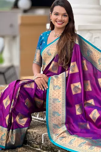 Magenta woven meenakari faux banarasi silk blend saree