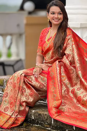 Red kanjivaram silk blend woven graceful partywear saree