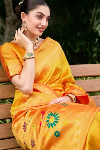 Orange silk blend woven zari ceremonial saree