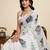 Off white color linen fabric beautiful printed ceremonial saree