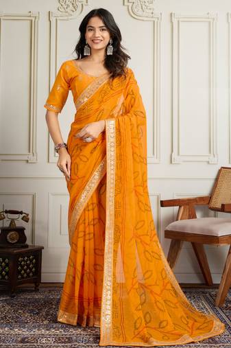 Yellow color festive special georgette fabric bandhej saree for festive looks