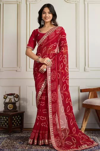 Maroon color festive special georgette fabric bandhej saree for festive looks