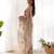 Beige color butterfly net fabric designer thread embroidery work ceremonial saree