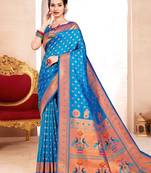 Blue color paithani silk woven ceremonial rich looks saree