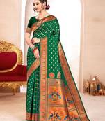 Green color paithani silk woven ceremonial rich looks saree
