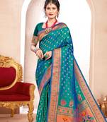 Sea green color paithani silk woven ceremonial rich looks saree