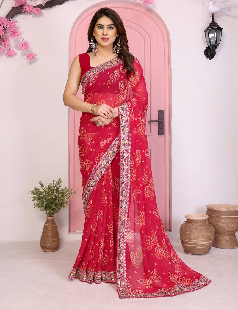 Pink color beautiful printed georgette saree with embroidered lace border
