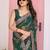 Teal color beautiful printed georgette saree with embroidered lace border