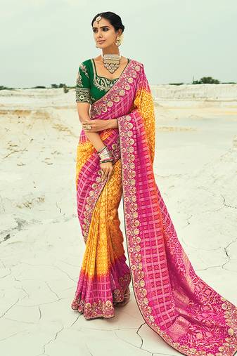 Mustard and rani pink embroidered georgette bandhej designer saree