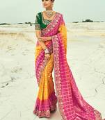 Mustard and rani pink embroidered faux georgette bandhej saree