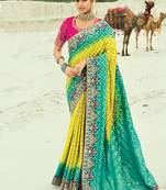 Turquoise & lime tellow embroidered faux georgette bandhej saree