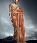 Orange tissue organza saree with moti, cutdana & sequins work